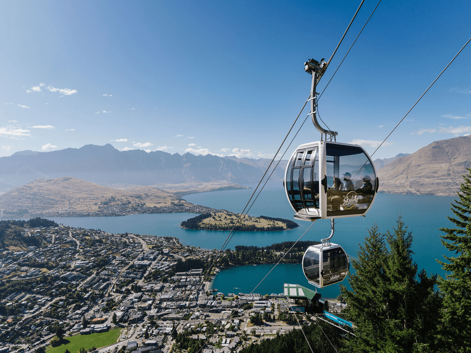 Skyline Queenstown Gondola with view of Queenstown and Lake Wakatipu in the background