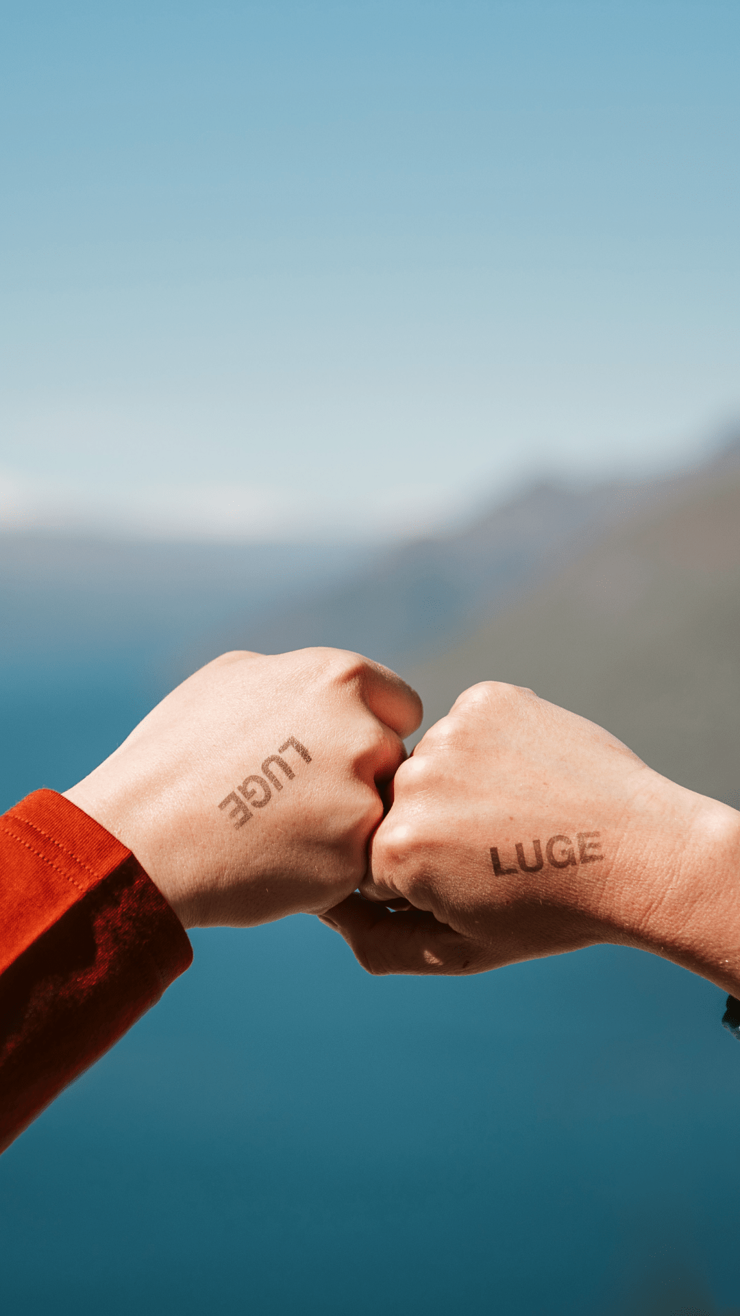 Two fists doing a fist bump