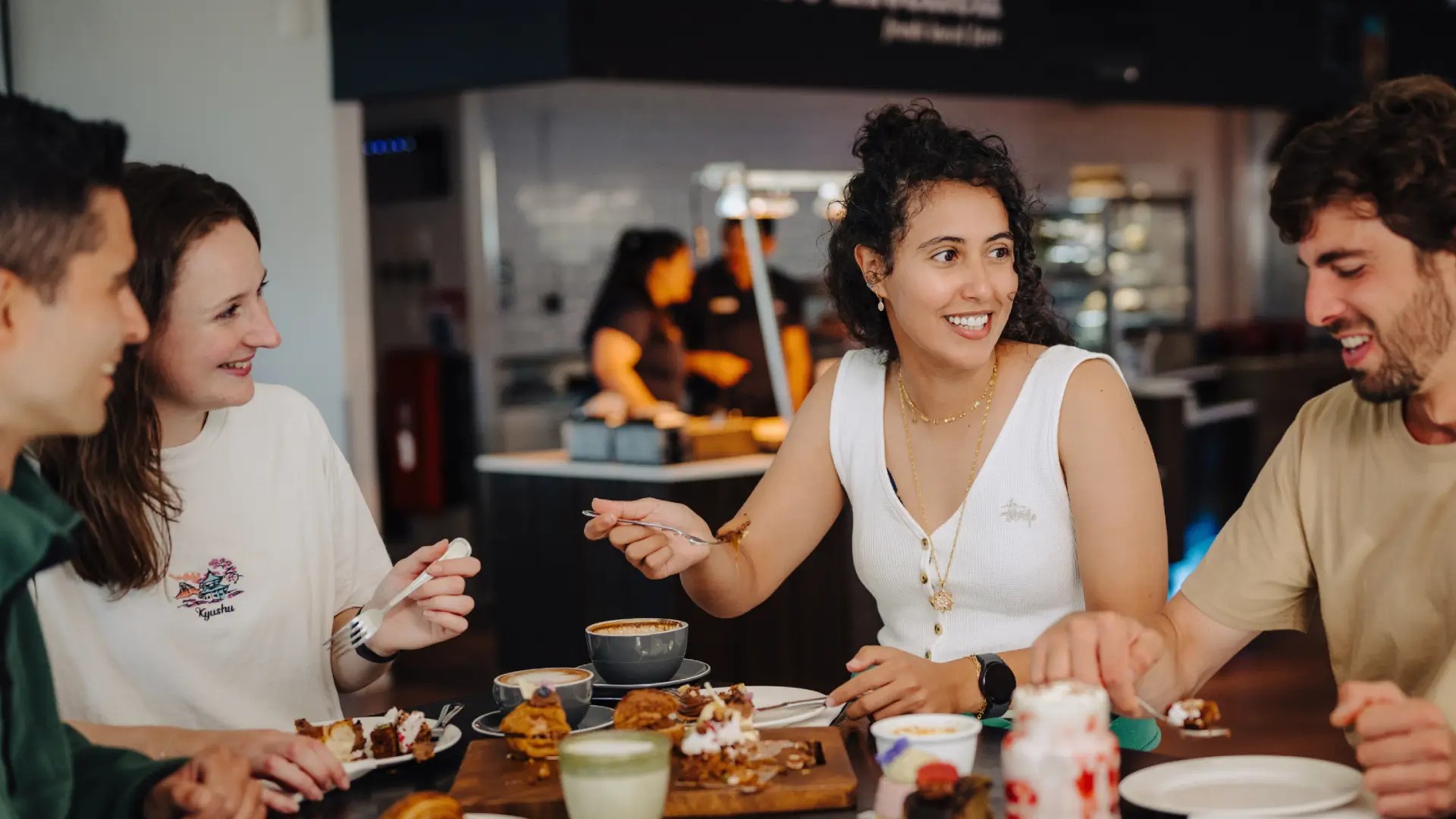 Guests enjoying desserts and coffee at Queenstown Café and Bar, Skyline Queenstown’s all-day dining venue.