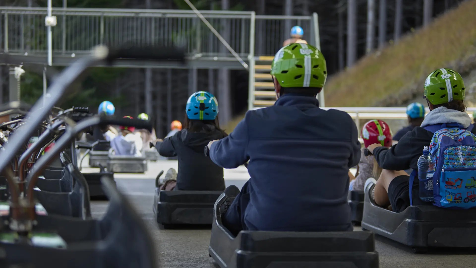 queenstown.jpg Guests riding Skyline Queenstown Luge carts before the carts begin their recycling journey at the end of their service life.