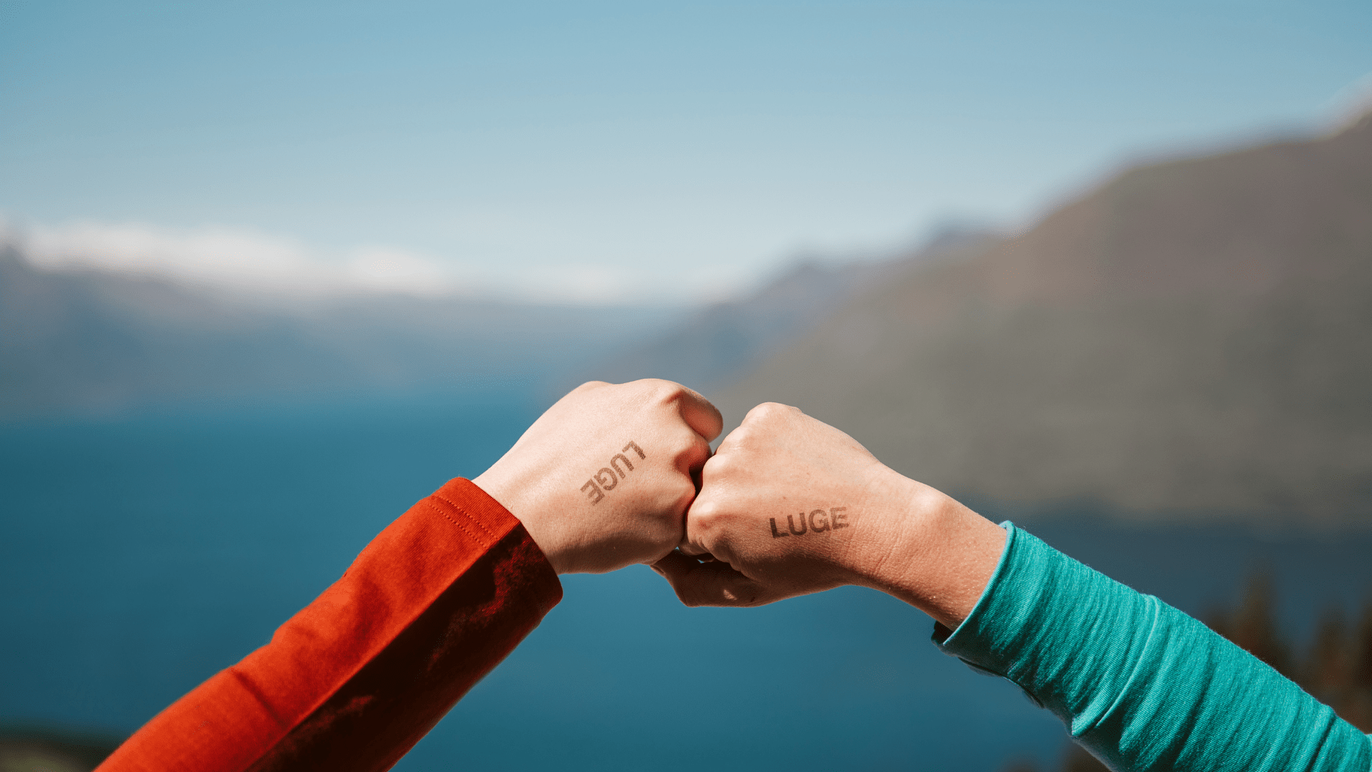 Two hand fist bumping in celebration