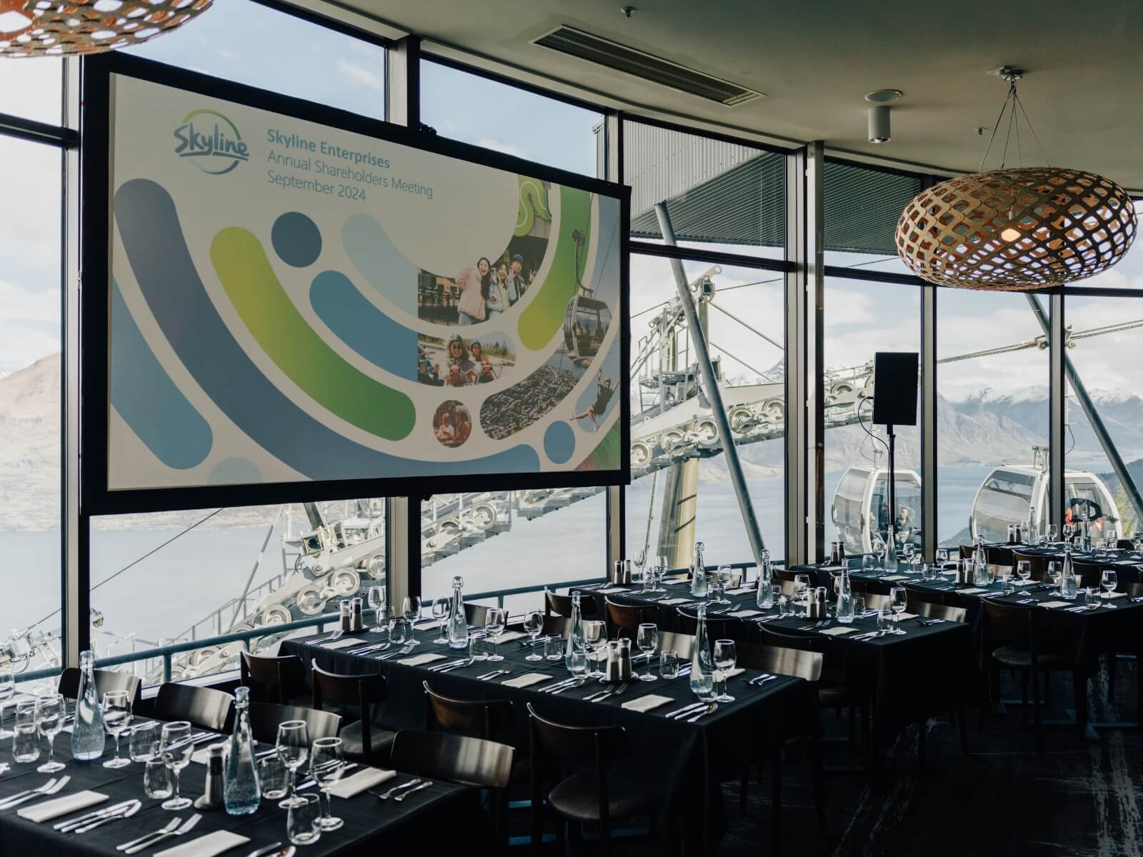 Presentation screen with Stratosfare restaurant laid out for a conference
